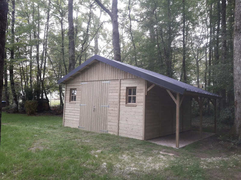 abri de jardin bois trait  coeur 18m + couverture bac acier + bucher 4m24x4m24