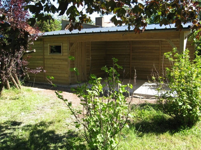 abri en bois trait 3m17x3m11 +6 auvent 4m56