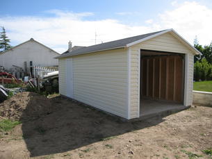 Garage avec portail basculant 337x605