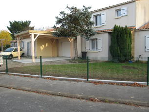 Carport devant garage 350x500